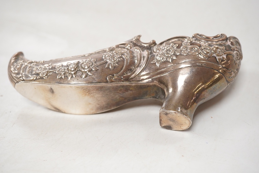 An early 20th century Hanau large novelty silver pin cushion(lacking cushion), modelled as a lady's shoe, import marks for Berthold Muller, Chester, 1907, 15.5cm, 4.8oz.